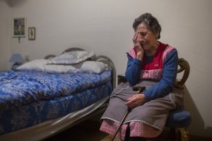 Carmen Martinez Ayudo, 85, cries during her eviction in Madrid, Spain, Friday, Nov. 21, 2014 desahucios / desahuciada